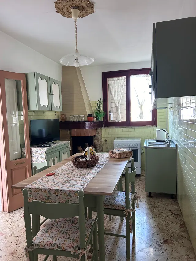 BookNoFees: Ferienwohnung in MAGLIE – Ferienhaus „Il Giardino Segreto“ mit Kamin